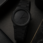 Black Minimalist Analog Wrist Aura Watch With Stainless Steel Strap And Butterfly Lock